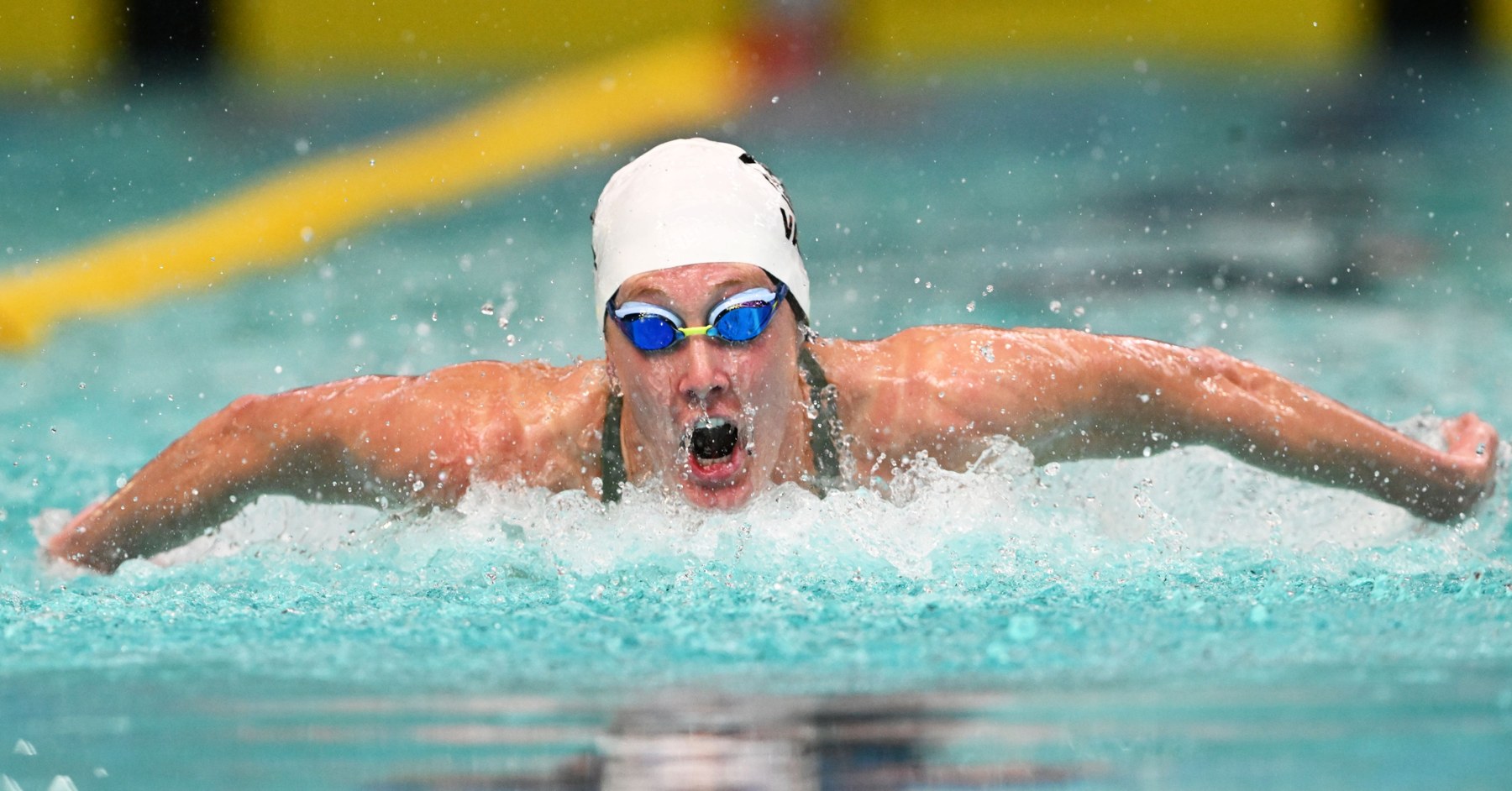 Taylor Ruck racing butterfly at the 2026 Canadian Swimming Trials